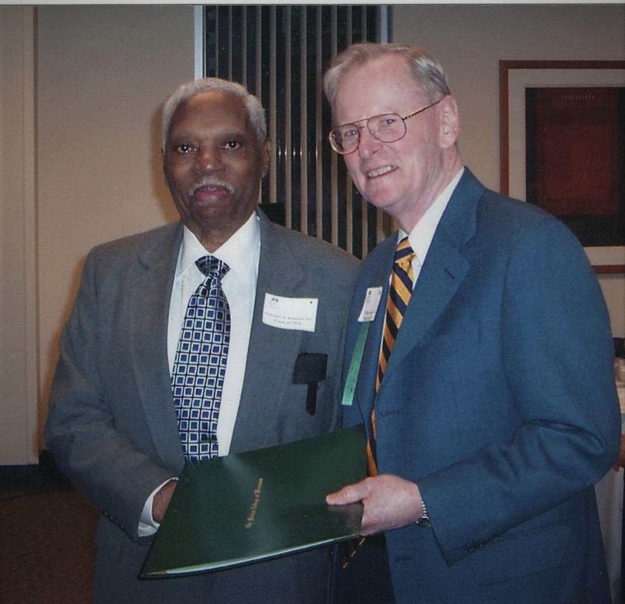 Dr. Nathaniel Robinson and  T. Michael Bolger, JD