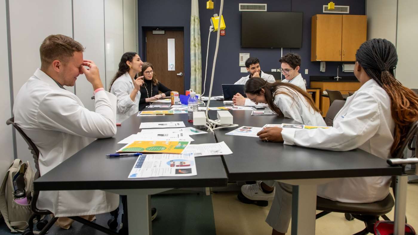 Dr. Emma Hilgendorf with pharmacy students