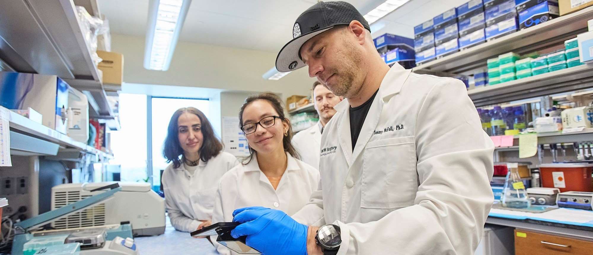 Tommy McFall, PhD, and lab members