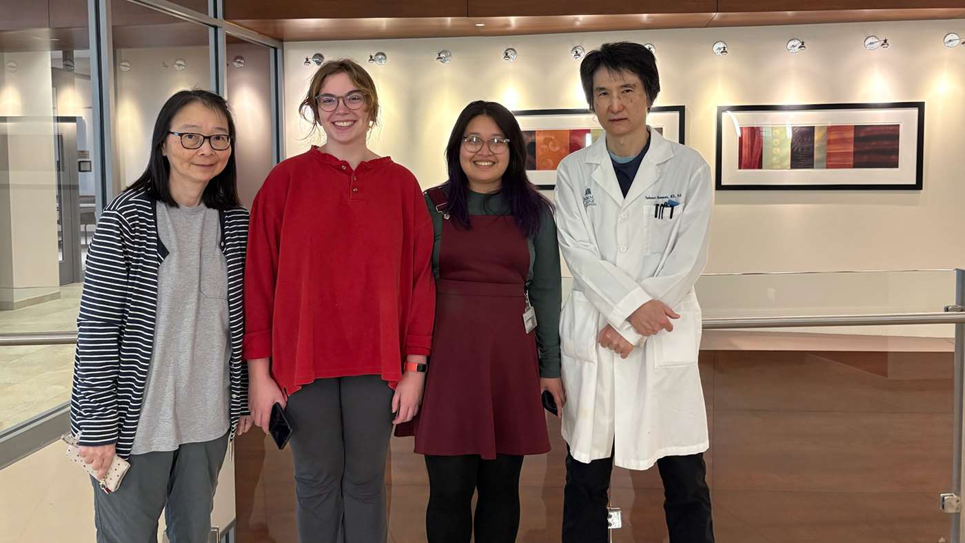 Akiko Mammoto, MD, PhD (left) and her lab team
