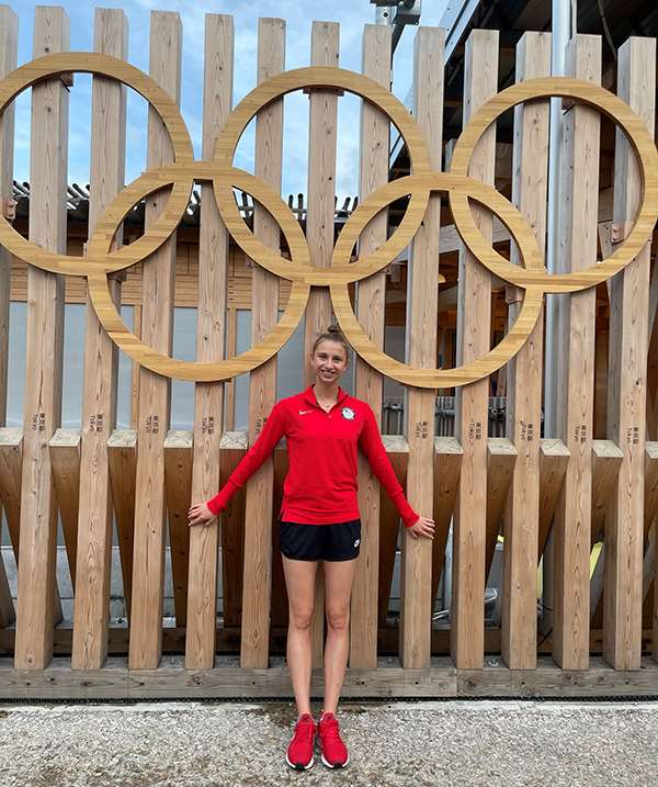 Liza Merenzon in front of Olympic Rings
