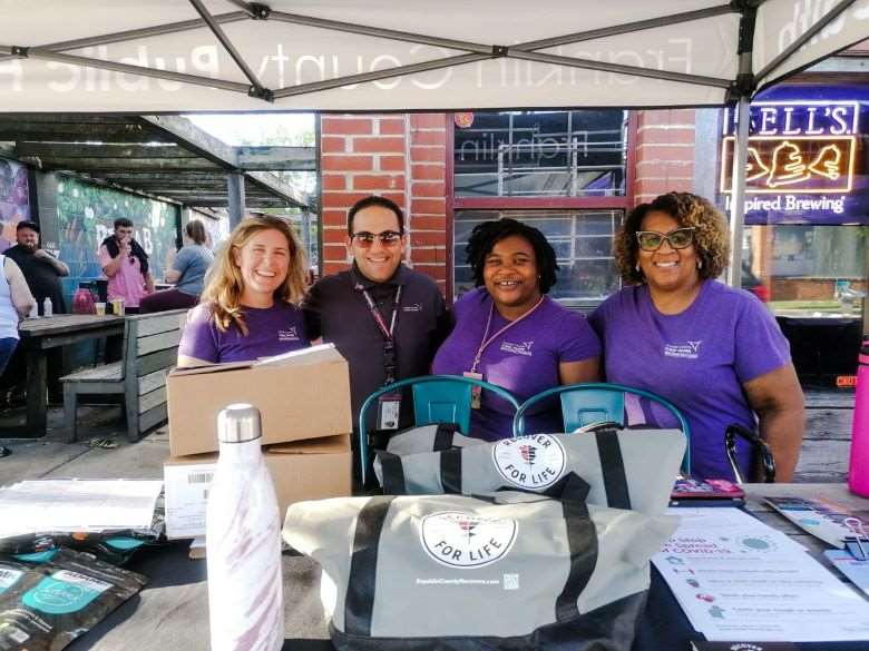 Hazem and friends at Recover for Life Event table