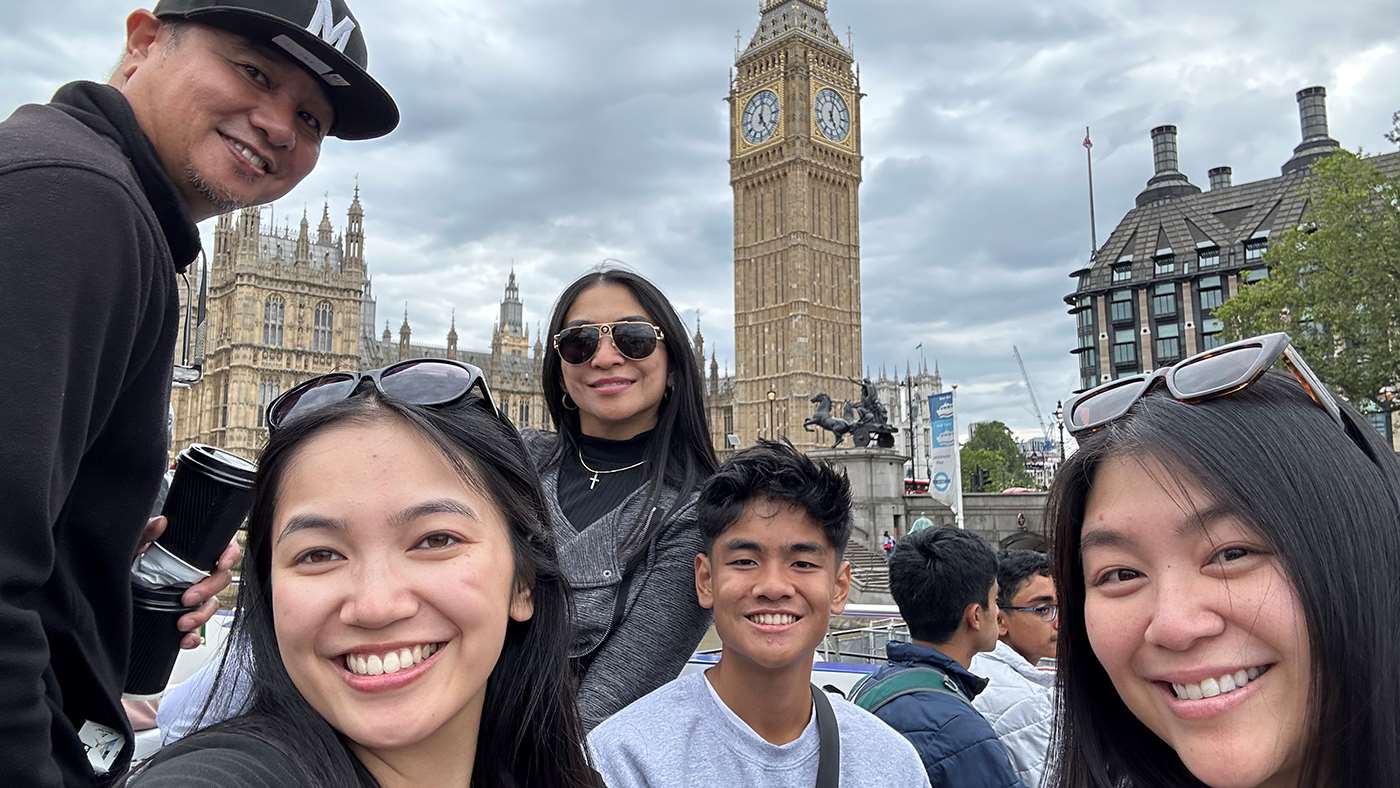 Raina Mari De La Cruz with her family in London