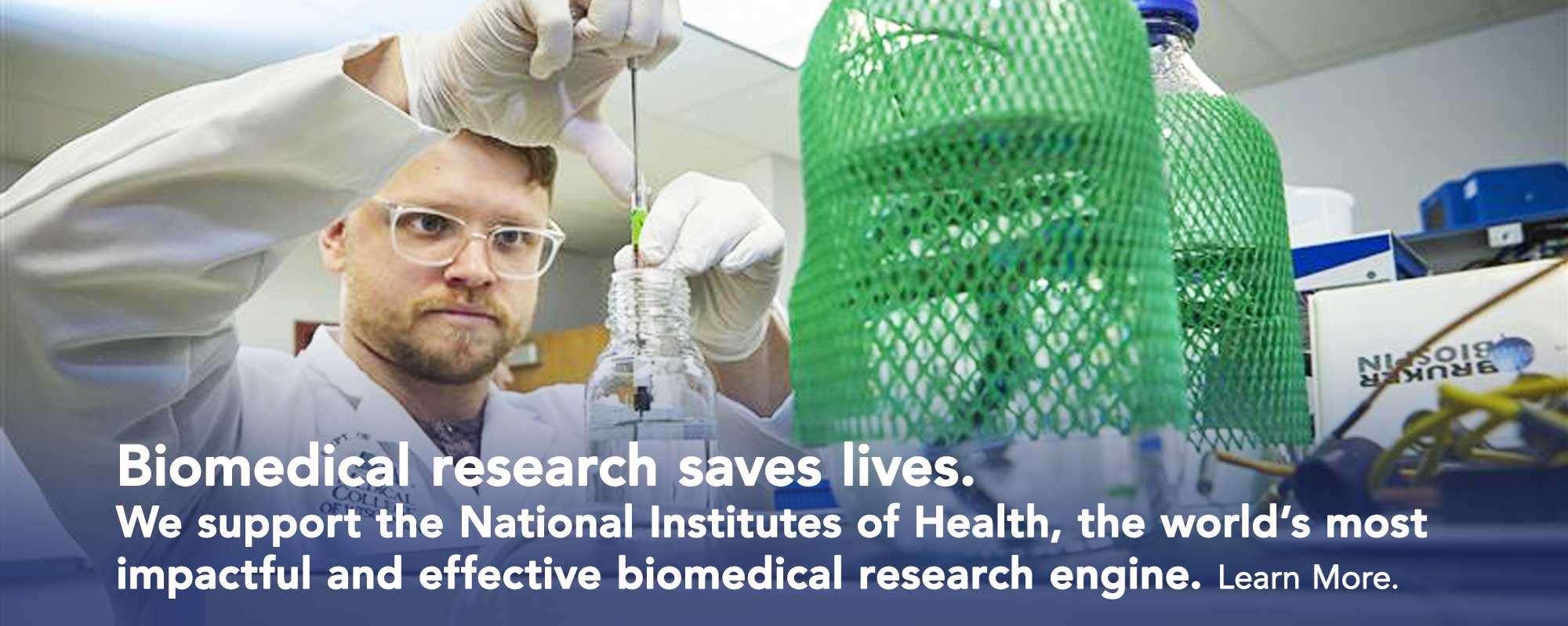 researcher in laboratory performing an experiment